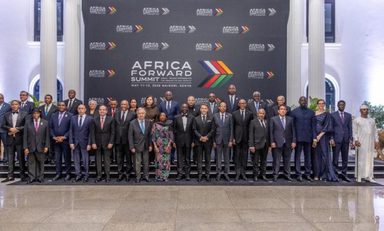 Group of dignitaries in formal attire posing on a stage in front of an Africa Forward Summit backdrop, Nairobi, Kenya (May 11–12, 2026).