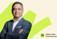 Portrait of Abhey Lamba in a blue checkered suit with arms crossed, labeled Chief Financial Officer (CFO). Background features bright lime geometric shapes.