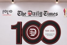 Banner celebrating 100 years of The Daily Times (1926–2026) with Folio Communications logo on a white wall.