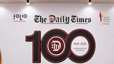 Banner celebrating 100 years of The Daily Times (1926–2026) with Folio Communications logo on a white wall.