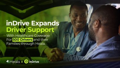 Handshake between a medical professional and a driver inside a car, promoting inDrive's driver support and healthcare coverage (partnership with Heala).